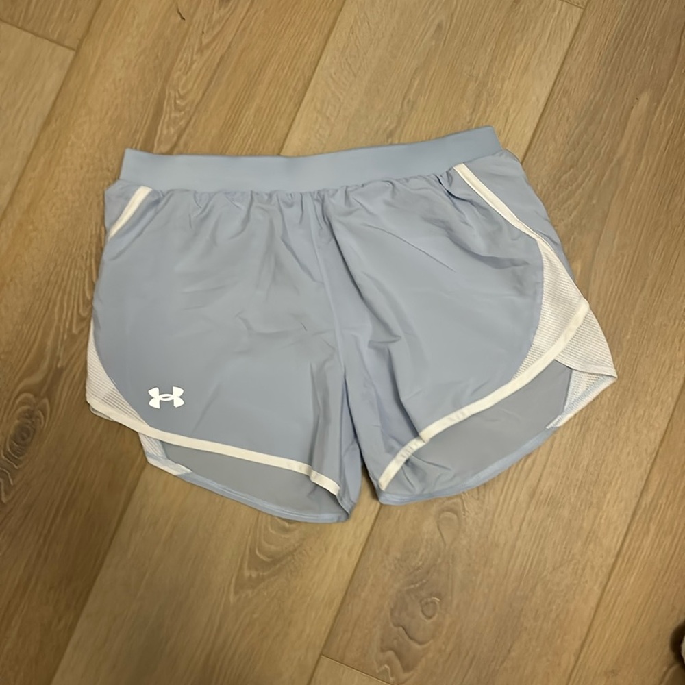 Light blue under armour running shorts MED
